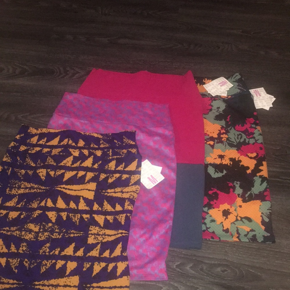 Bundle of 4 medium LuLaRoe Cassie skirts